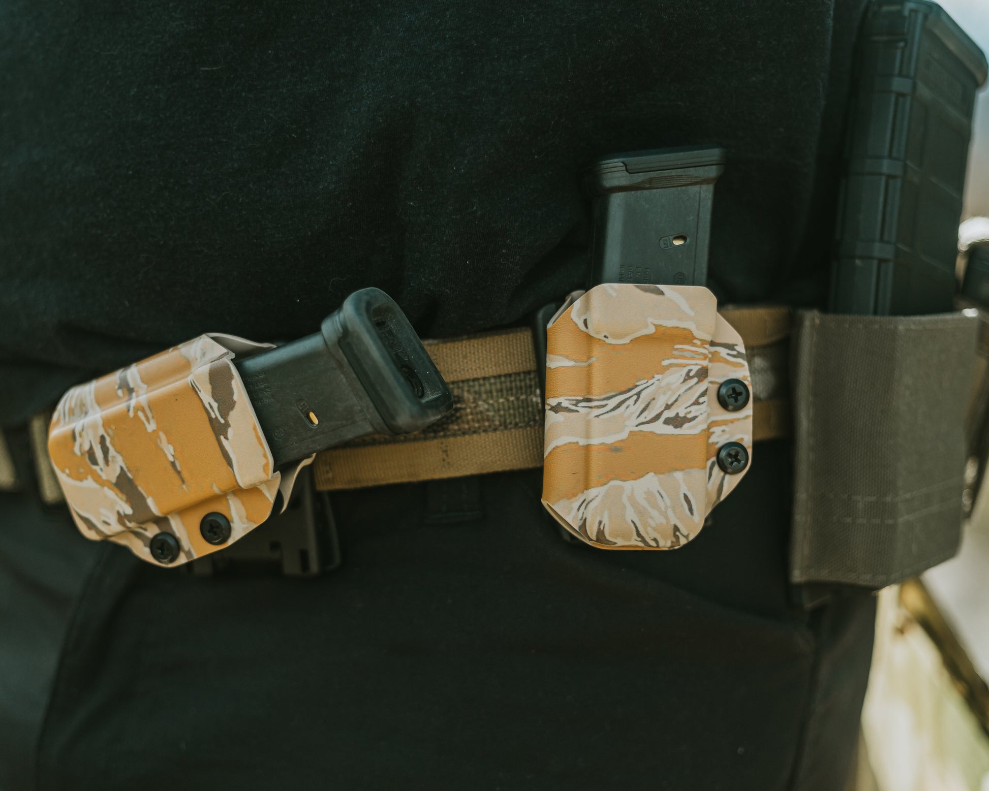 Canted mag carrier. Canted mag holder. Desert tiger stripe. OWB pistol mag carriers.